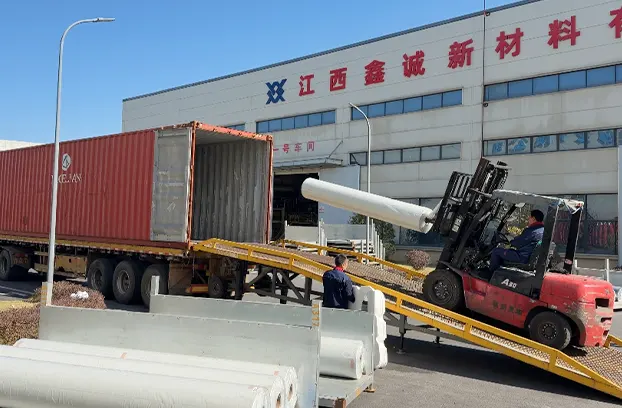 Container loading of tarpaulin rolls