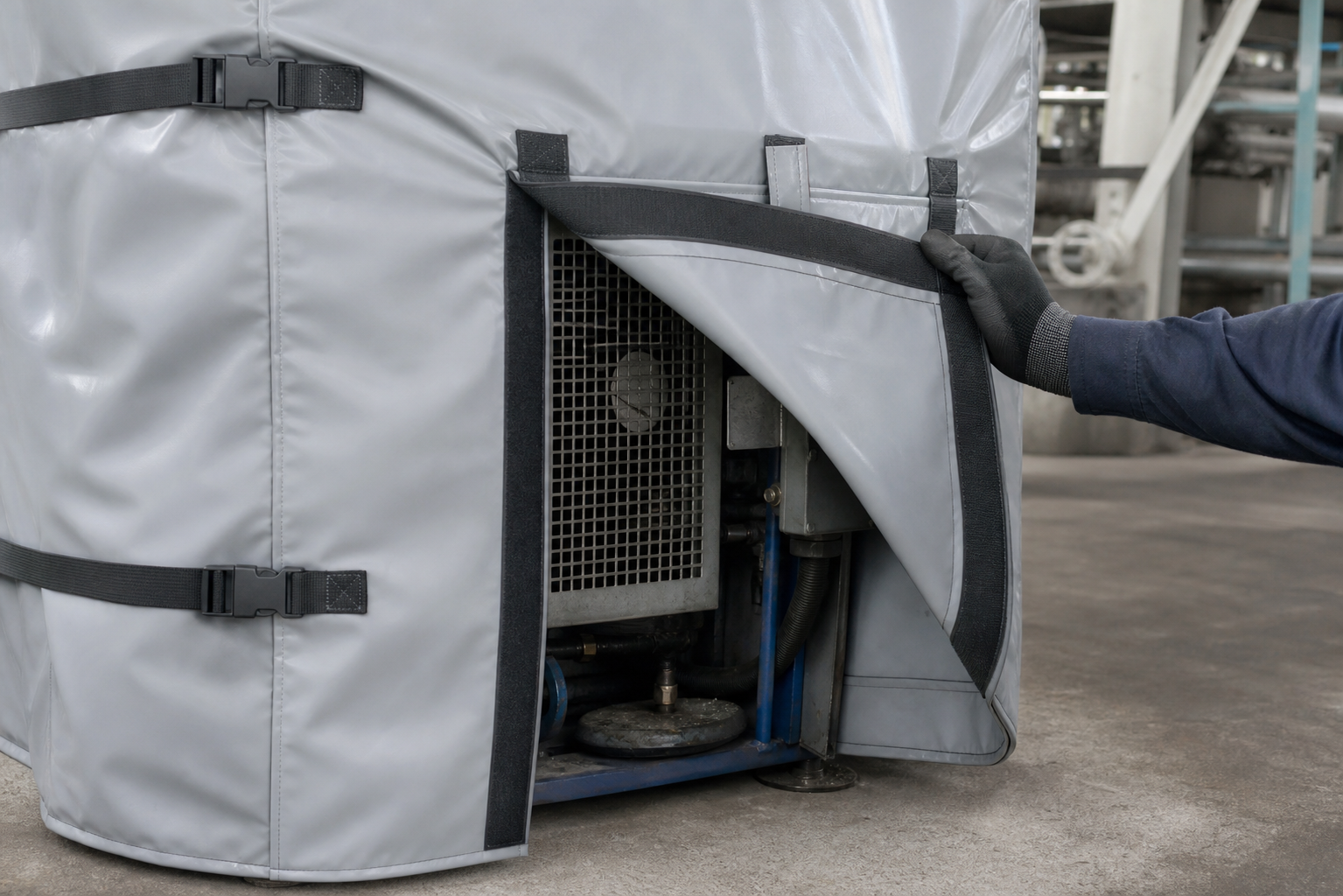Equipment cover access flap with reinforcement and fastening straps opened for service inspection