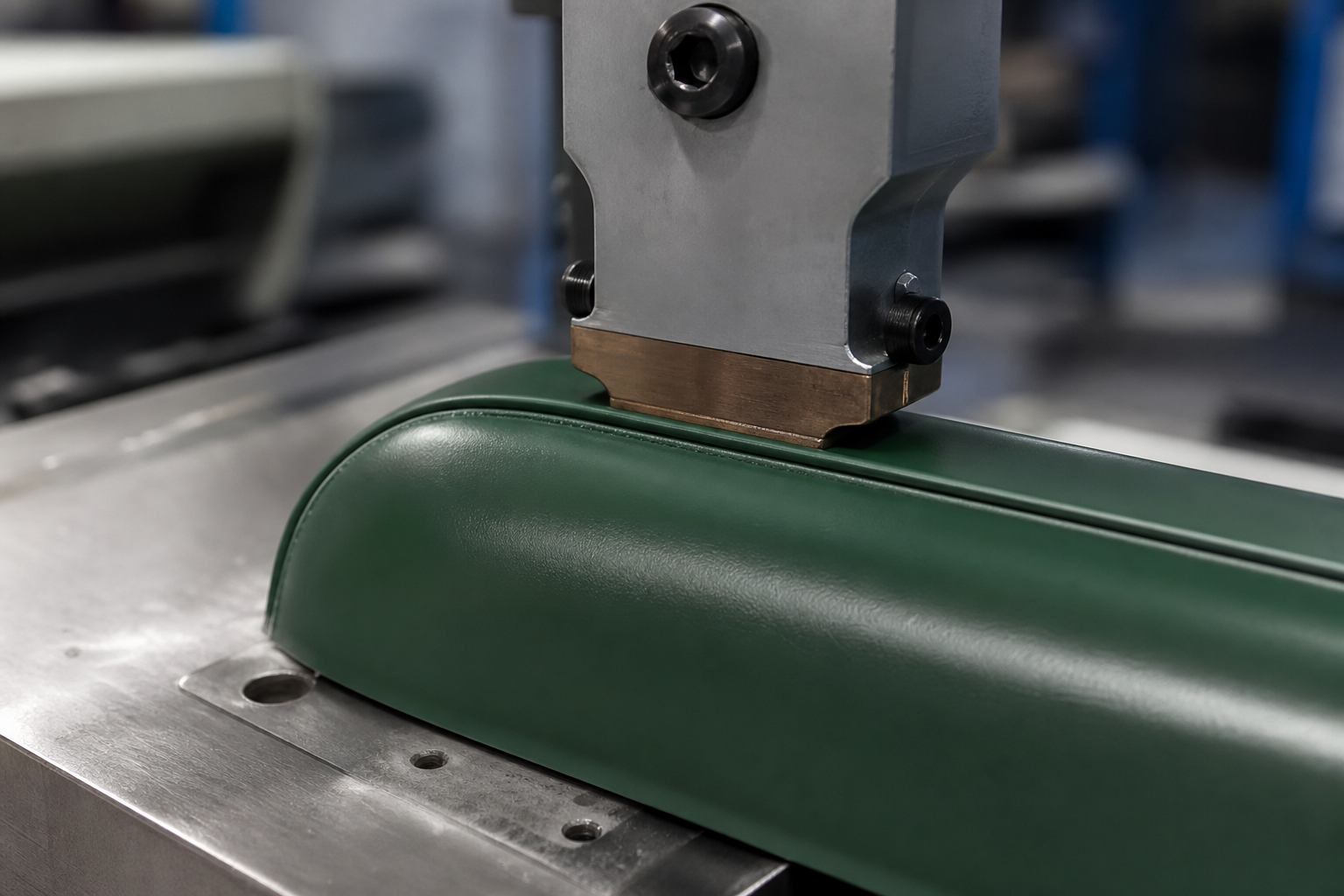 High frequency welding press forming a precise seam on a shaped PVC tarp component
