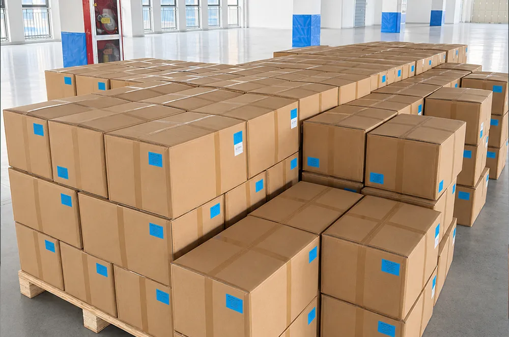 Bulk custom tarp cartons labeled and stacked on pallets for export handling