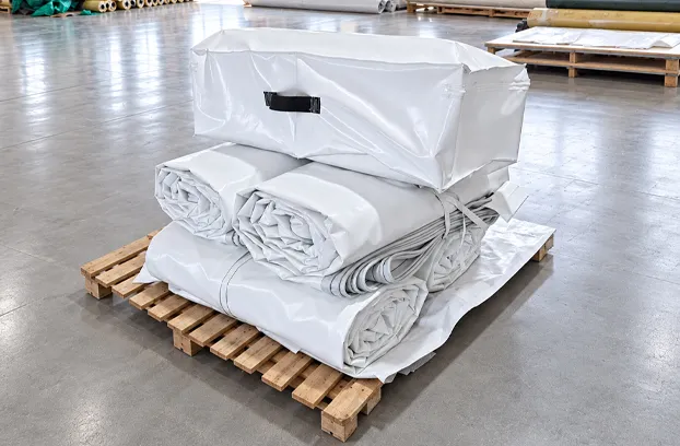 white-pvc-tarpaulins-on-pallet