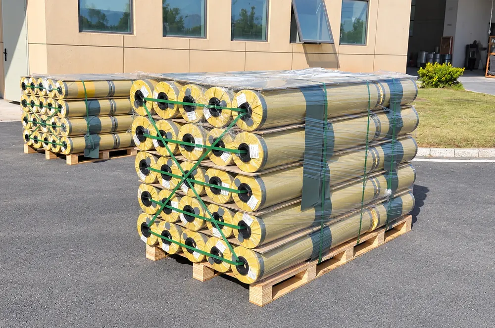 palletized-wrapped-pvc-rolls-outdoors